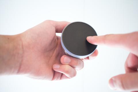 SPIN remote touch pad with two hands