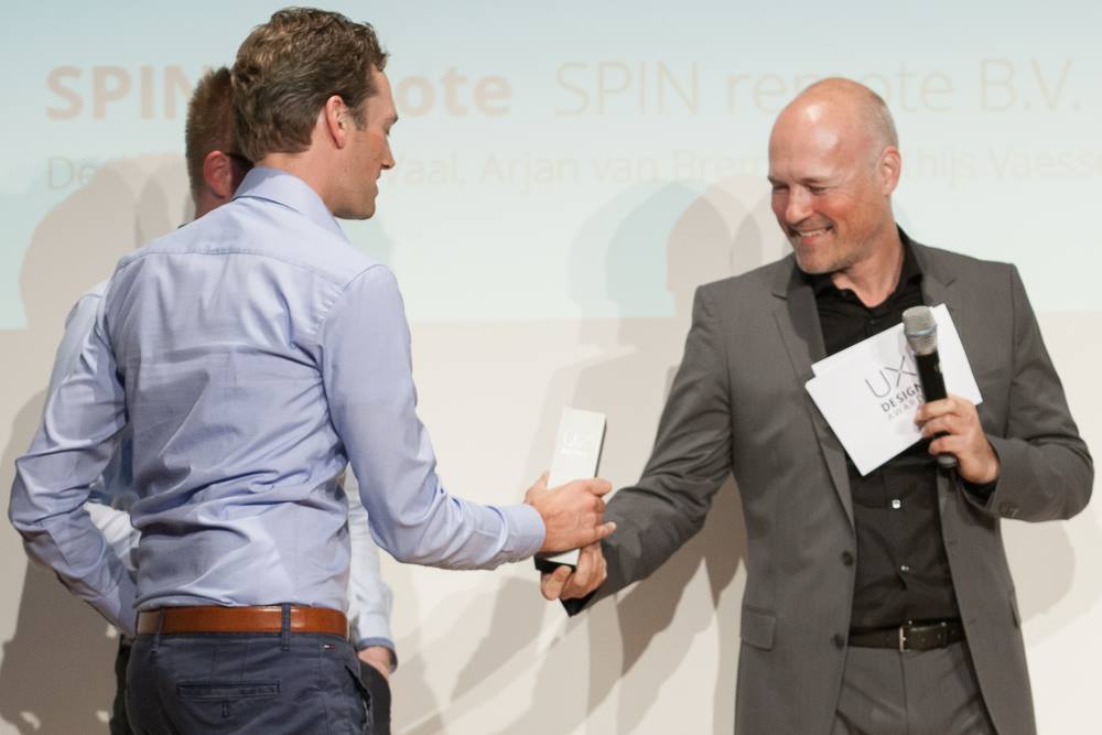 The SPIN remote team, receiving the UX Design Award 2015 from Peter Wouda - Design Director, Volkswagen